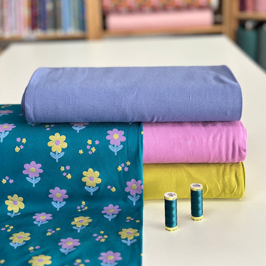 Fleurs brillantes pétrole- Jersey imprimé