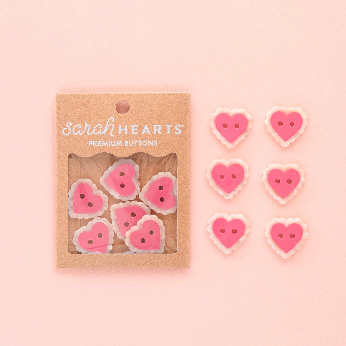 Grands boutons roses en forme de cœur 1"