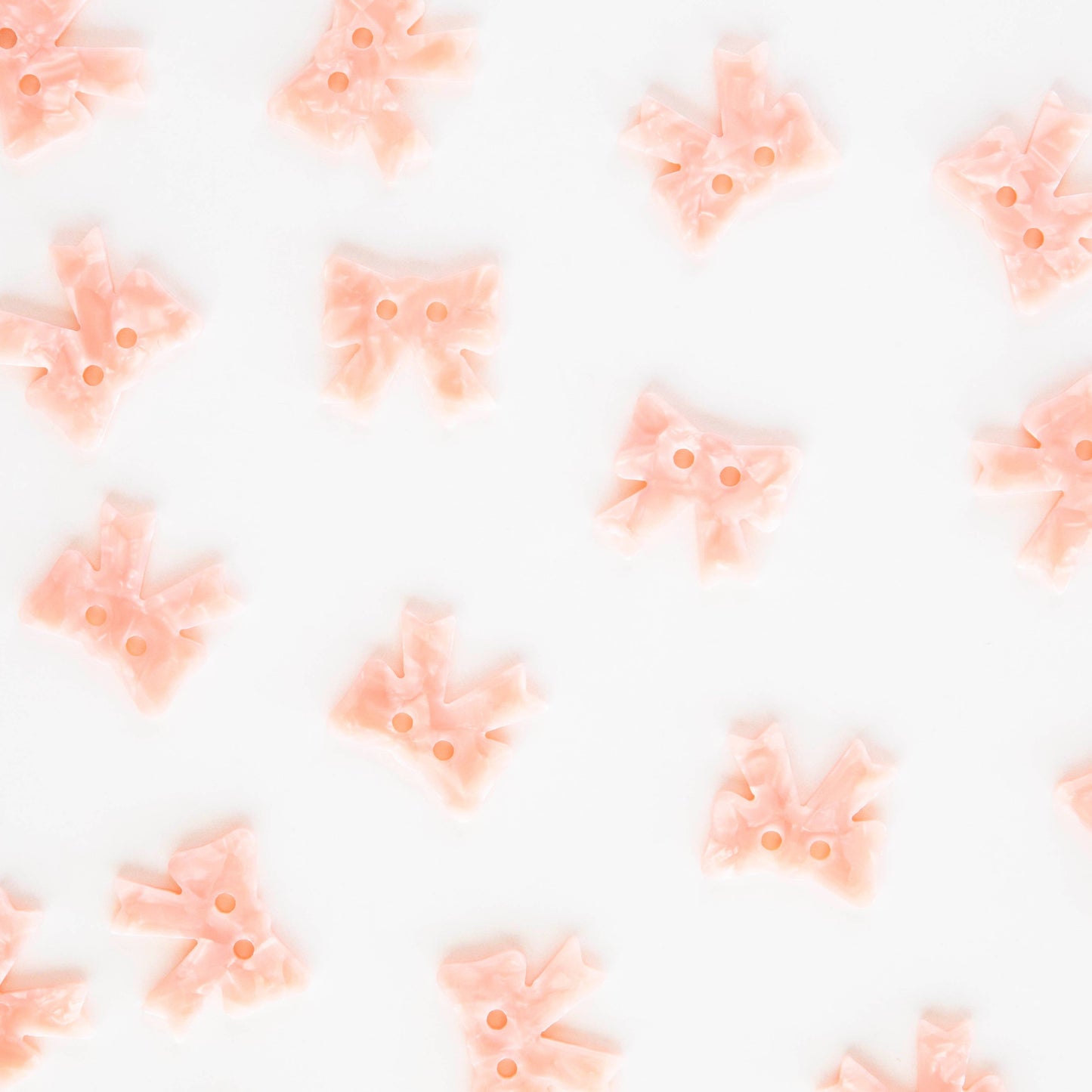 Grands boutons roses avec nœud de 1"