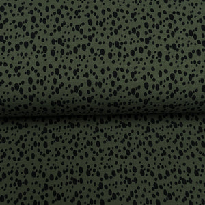 Black dots on green background - Printed jersey