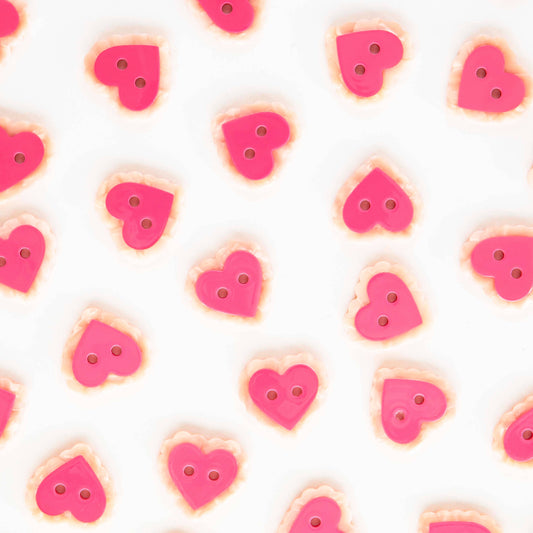 Grands boutons roses en forme de cœur 1"